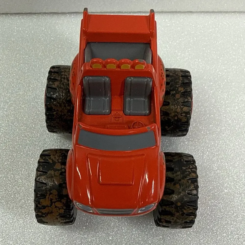 Blaze & The Monster Machines Mud Racin' Blaze Muddy Tires Die Cast Truck Red